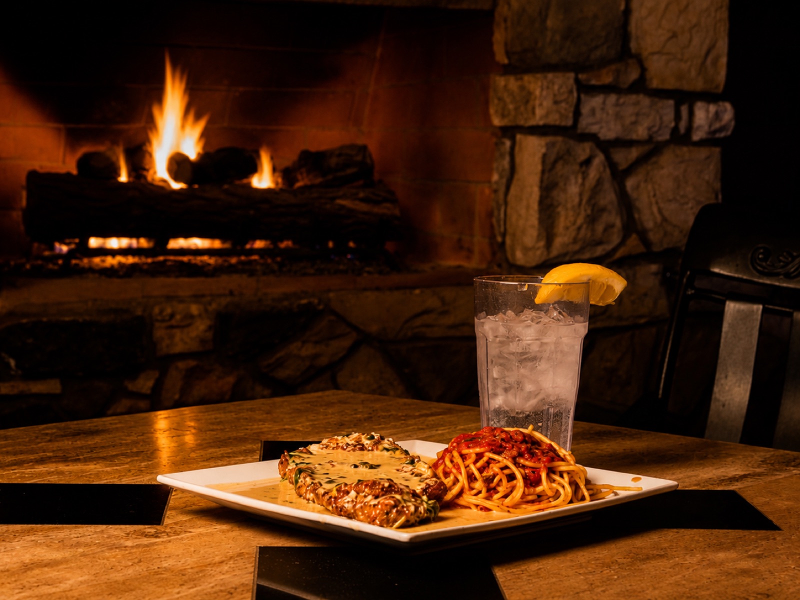 Dinner by the fireplace at Mama Carpino's